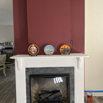 Home & Land Repairs - Finished product after installing upgraded fireplace and installing stone tile. - Handyman Near Me
