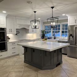 Bob's Furniture Restorations - Kitchen cabinetry refinished in White Dove. Professionally sprayed using the best industry grade finishes.
