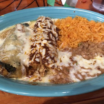 Charras And Tequila - Combination plate with Chile relleno and pork tamal - Mexican Near Me - Bismarck, North Dakota