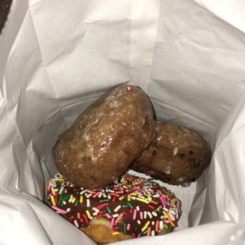 Donut Express - two donuts in a paper bag - Bakeries Near Me - Georgetown, Kentucky