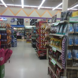 a wide aisle in a grocery store