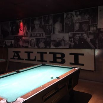 Alibi - Cool picture collage on the back wall. - Dive Bars Near Me - San Diego, California Alibi - Cool picture collage on the back wall. - Dive Bars Near Me - San Diego, California