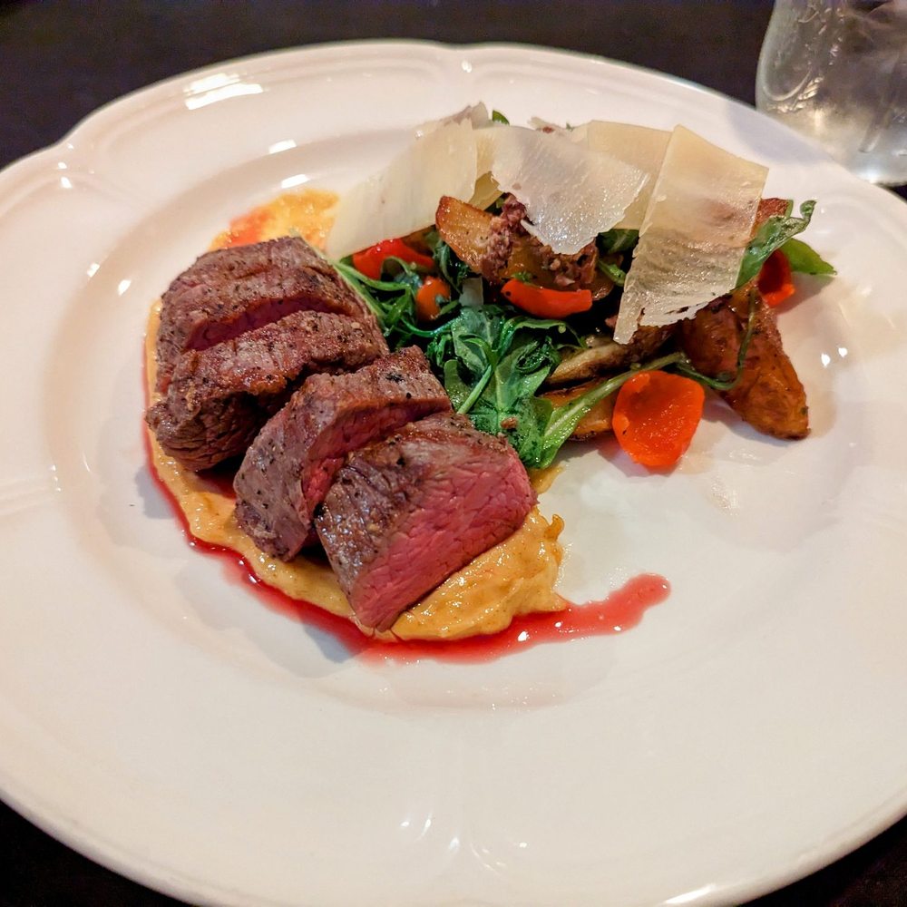Antebellum - Grilled Tenderloin of Beef Shoulder with smoked aioli, roasted fingerling potatoes, wild arugula, olive tapenade, pickled sweet peppers, and - New American Near Me - Flowery Branch, Georgia
