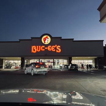 Buc-ee's - a car in front of a buc - ee's store - Gas Stations Near Me - Denton, Texas