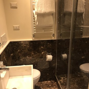 Nerva Boutique Hotel - Very small bathroom with little room to move - Hotels Near Me - Rome, RM Nerva Boutique Hotel - Very small bathroom with little room to move - Hotels Near Me - Rome, RM