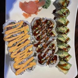 Harry's American Bar & Grill - Dragon roll, eel and cucumber roll, and spicy tuna roll
