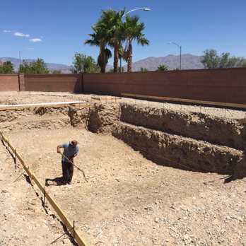 Dw Landscape - a man working on a construction site - Landscaping Near Me - Henderson, Nevada