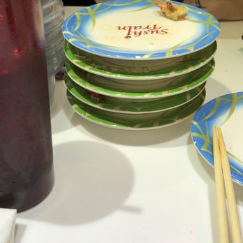 Sushi Train - We were only $8 into the meal, with 3 people eating, when the server decided to tell us it's $20 per person all you can eat - Sushi Bars Near Me - Nashville, Tennessee