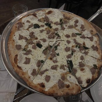 Juliana's - White pizza with sausage and fennel - Pizza Near Me - Brooklyn, New York Juliana's - White pizza with sausage and fennel - Pizza Near Me - Brooklyn, New York