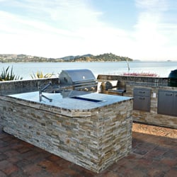 Unlimited Outdoor Kitchen - This kitchen with stacked stone, granite counter top, oh and a spectacular view is sure to impress.