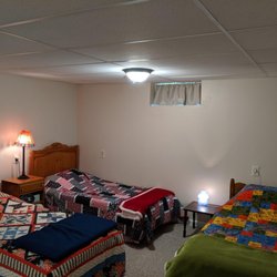 The Getaway Place - Some of our very comfy beds with homemade cozy quilts.
