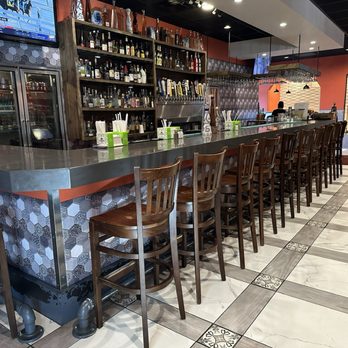 Hacienda Real - a bar with a lot of chairs - New Mexican Cuisine Near Me - Omaha, Nebraska Hacienda Real - a bar with a lot of chairs - New Mexican Cuisine Near Me - Omaha, Nebraska