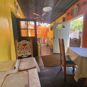 Zacatlán Restaurant - The completely empty patio -- too hot to eat here (accept apparently for disabled people). - Mexican Near Me - Santa Fe, New Mexico