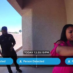 Julia Feng - Evernest Realty Las Vegas - The agent getting the key front under the mat in front of a client