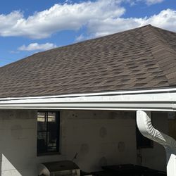 New roof and framing on a covered patio!  All new beams, 6x6 posts, and gutter work with facia and soffit!