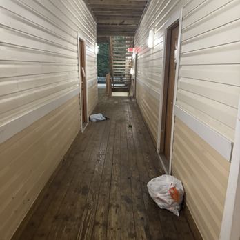 Truman Park - Trash left on the ground instead of bins. - Apartments Near Me - Largo, Maryland
