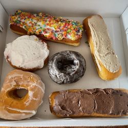 Jeff's Donuts - Fruity pebbles, maple long John, raspberry filled, chocolate cake donut, glazed, reg long John