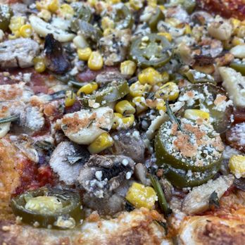 MOD Pizza - a pizza with various toppings - Fast Food Near Me - Houston, Texas