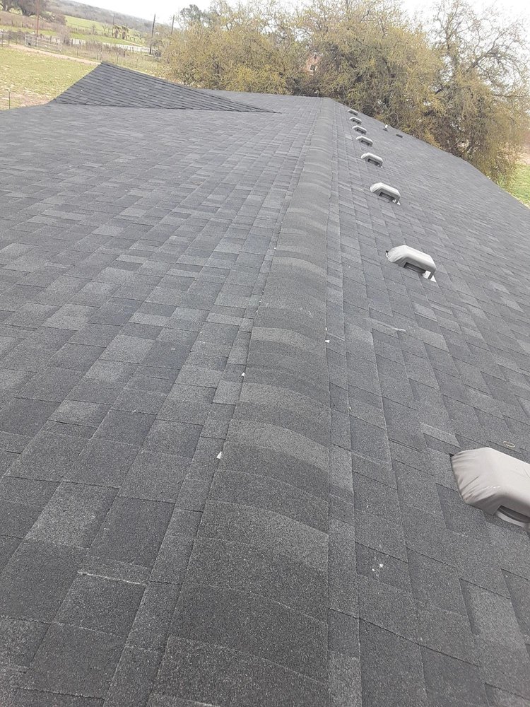 Slide of Leo's S & S Roofing