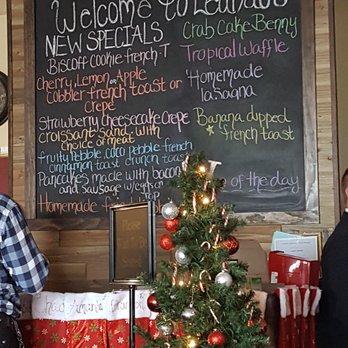 Le Andos Cafe - a christmas tree in front of the menu - Salad Near Me - Macomb, Michigan Le Andos Cafe - a christmas tree in front of the menu - Salad Near Me - Macomb, Michigan