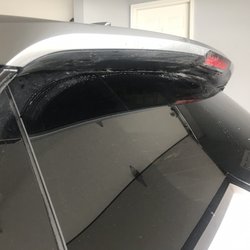 Classic Clean Auto Wash - If you look close, the remaining salt residue under the spoiler overhang.