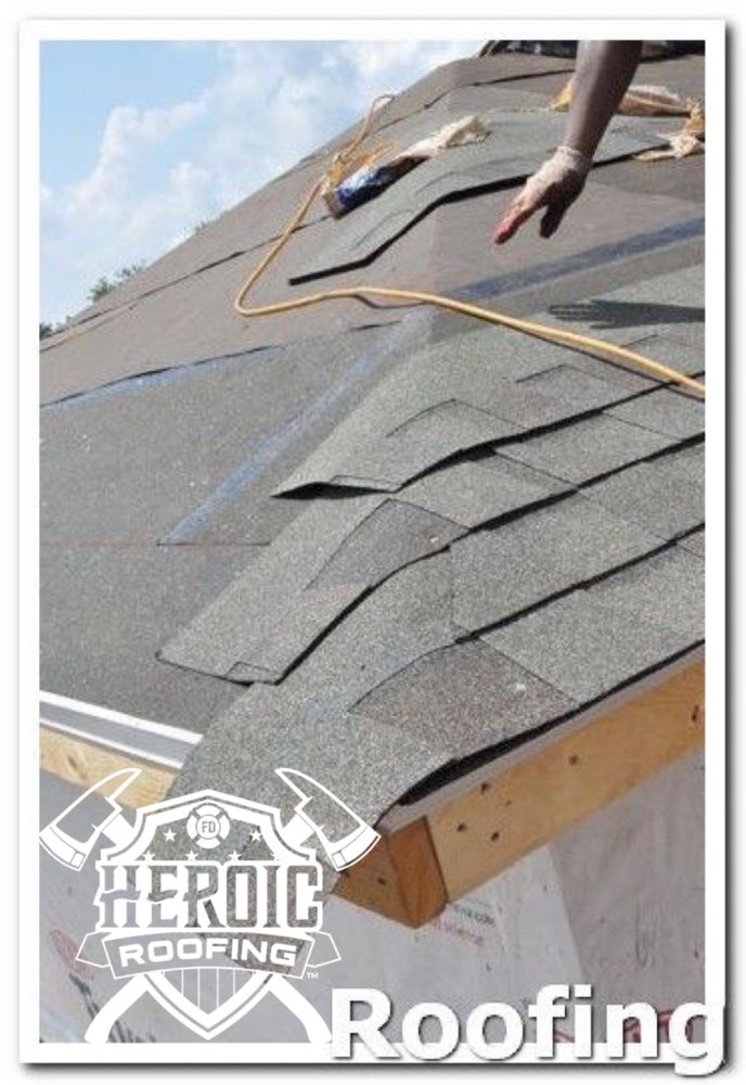 Slide of Heroic Roofing