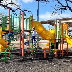 Lion's Park - Lions Park slides, swings and climbing for kids 4 and older.