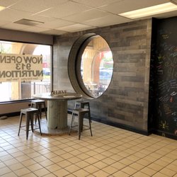 913 Nutrition - A Portion of the Dining Area and Signing Wall