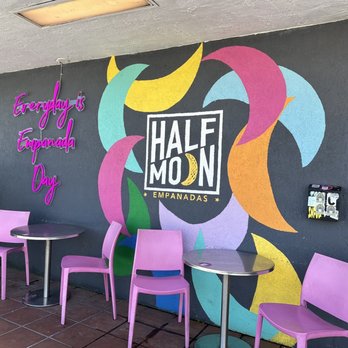 Half Moon Empanadas - Seating by the food window - Empanadas Near Me - Miami, Florida Half Moon Empanadas - Seating by the food window - Empanadas Near Me - Miami, Florida