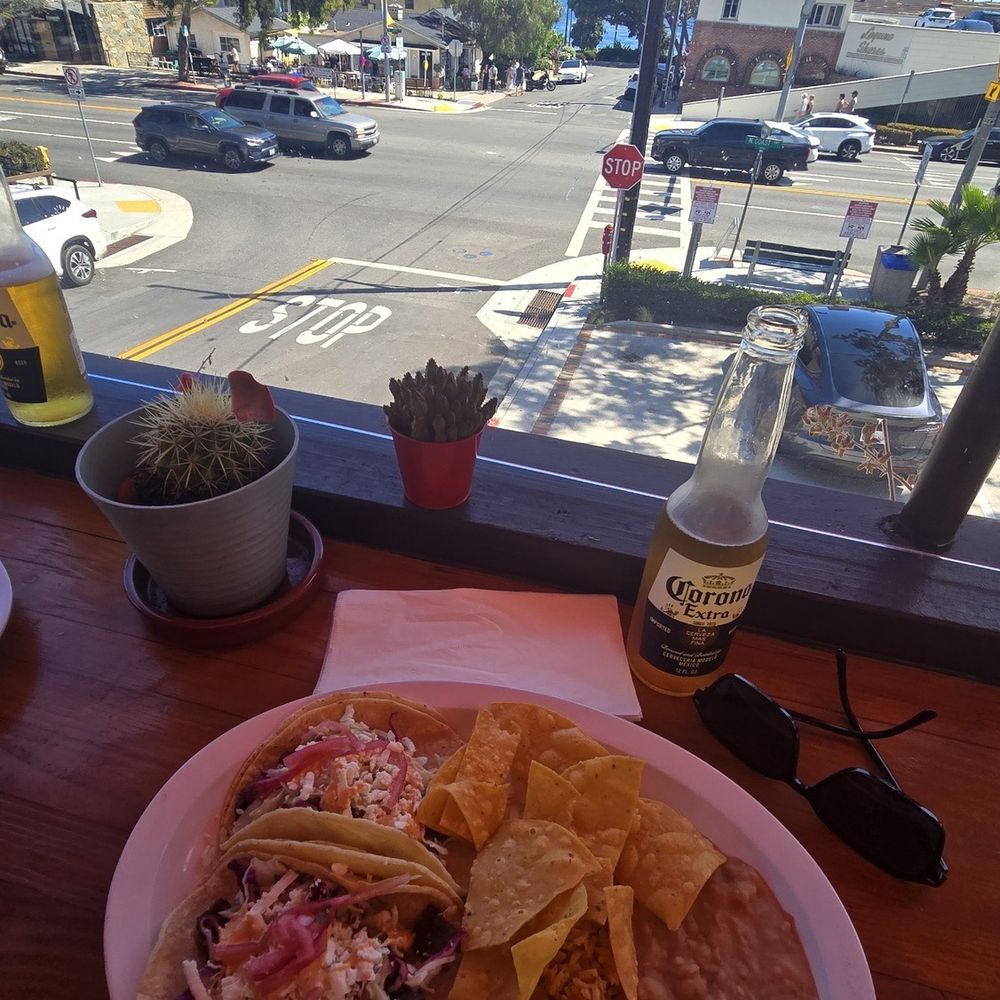 Fish taco plate with a Corona