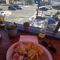 Fish taco plate with a Corona
