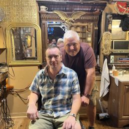 My son's FIRST professional haircut and shave in over two years and my son's proud dad!