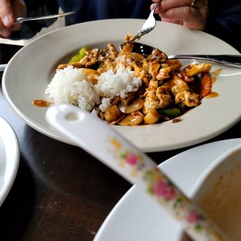 Basil Asian Bistro - Spicy Chicken with anxious fork - Szechuan Near Me - Wooster, Ohio