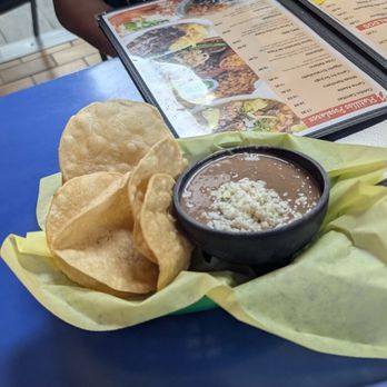 Carnitas Michoacan - Complimentary tostaditas with refried beans - Mexican Near Me - San Bernardino, California Carnitas Michoacan - Complimentary tostaditas with refried beans - Mexican Near Me - San Bernardino, California