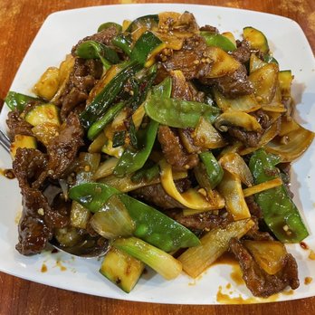 Four Seasons Chinese Restaurant - Mongolian Beef. Snap peas, zucchini, mushrooms, bamboo shoots, etc., don't belong in his dish. - Dim Sum Near Me - Clovis, California Four Seasons Chinese Restaurant - Mongolian Beef. Snap peas, zucchini, mushrooms, bamboo shoots, etc., don't belong in his dish. - Dim Sum Near Me - Clovis, California