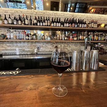Mignon Steak - a glass of wine on a bar - Wine Bars Near Me - Montreal, Quebec Mignon Steak - a glass of wine on a bar - Wine Bars Near Me - Montreal, Quebec