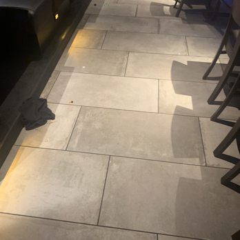 Yard House - They don't clean their floors. It's wet, sticky, & slick all over the restaurant . - New American Near Me - Atlanta, Georgia Yard House - They don't clean their floors. It's wet, sticky, & slick all over the restaurant . - New American Near Me - Atlanta, Georgia