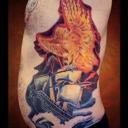 Vivid Skin Tattoo