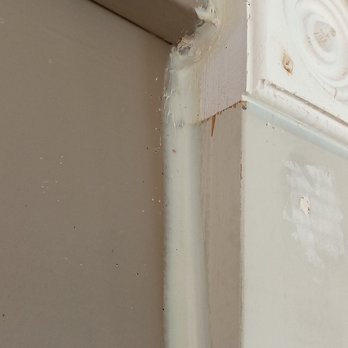 Pella - caulking over dirt and over 1" wide spread. - Windows Installation Near Me - Pella, Iowa