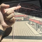 Photo of John & Joe's Pizzeria - Bronx, NY, United States. On a string wrapped