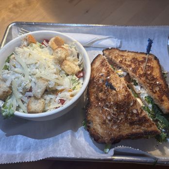 Public & General - Fried green tomato sandwich on sourdough with artichoke Caesar salad - Bars Near Me - Gainesville, Florida Public & General - Fried green tomato sandwich on sourdough with artichoke Caesar salad - Bars Near Me - Gainesville, Florida