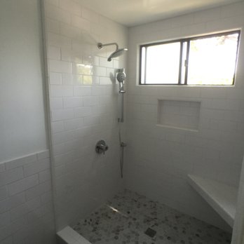 E & J Construction - converted old school tub to gorgeous walk in shower (new tile, plumbing, fixtures, recessed lights, paint) - General Contractors Near Me