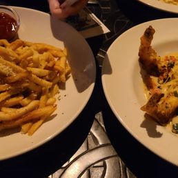 Good shrimp scampi, cold tiny steak and fries