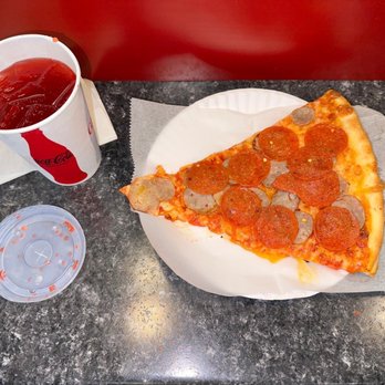 Lucia Pizza - Pepperoni and sausage pizza with Fruit Punch - Pizza Near Me - Flushing, New York Lucia Pizza - Pepperoni and sausage pizza with Fruit Punch - Pizza Near Me - Flushing, New York