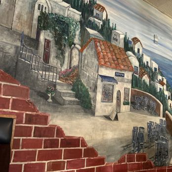 Basil's Pizza Palace - Mural on the far wall. - Pizza Near Me - Northfield, Minnesota