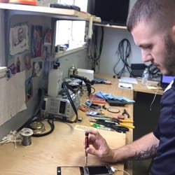 Technician repairing iPod