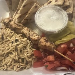 chicken skewers with rice and vegetables chicken skewers with rice and vegetables