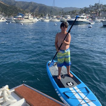 Go Sea It Charters - My son taking one of the paddle boards out - Boat Charters Near Me - Newport Beach, California