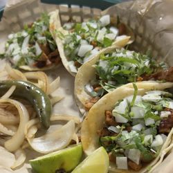 Taqueria Alexis - Tacos al pastor with a grill serrano pepper and onions.