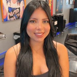 Dyed hair blue/black and haircut by Marci